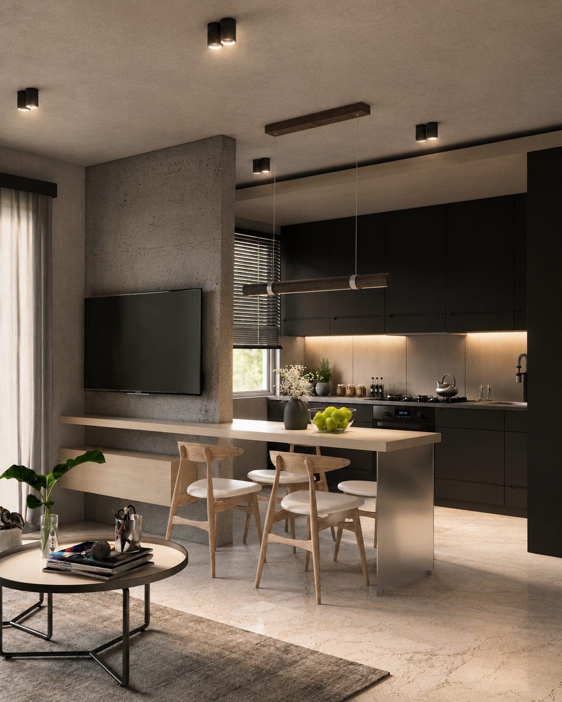 Cocina en negro mate y madera junto a una sala con muro de concreto visto