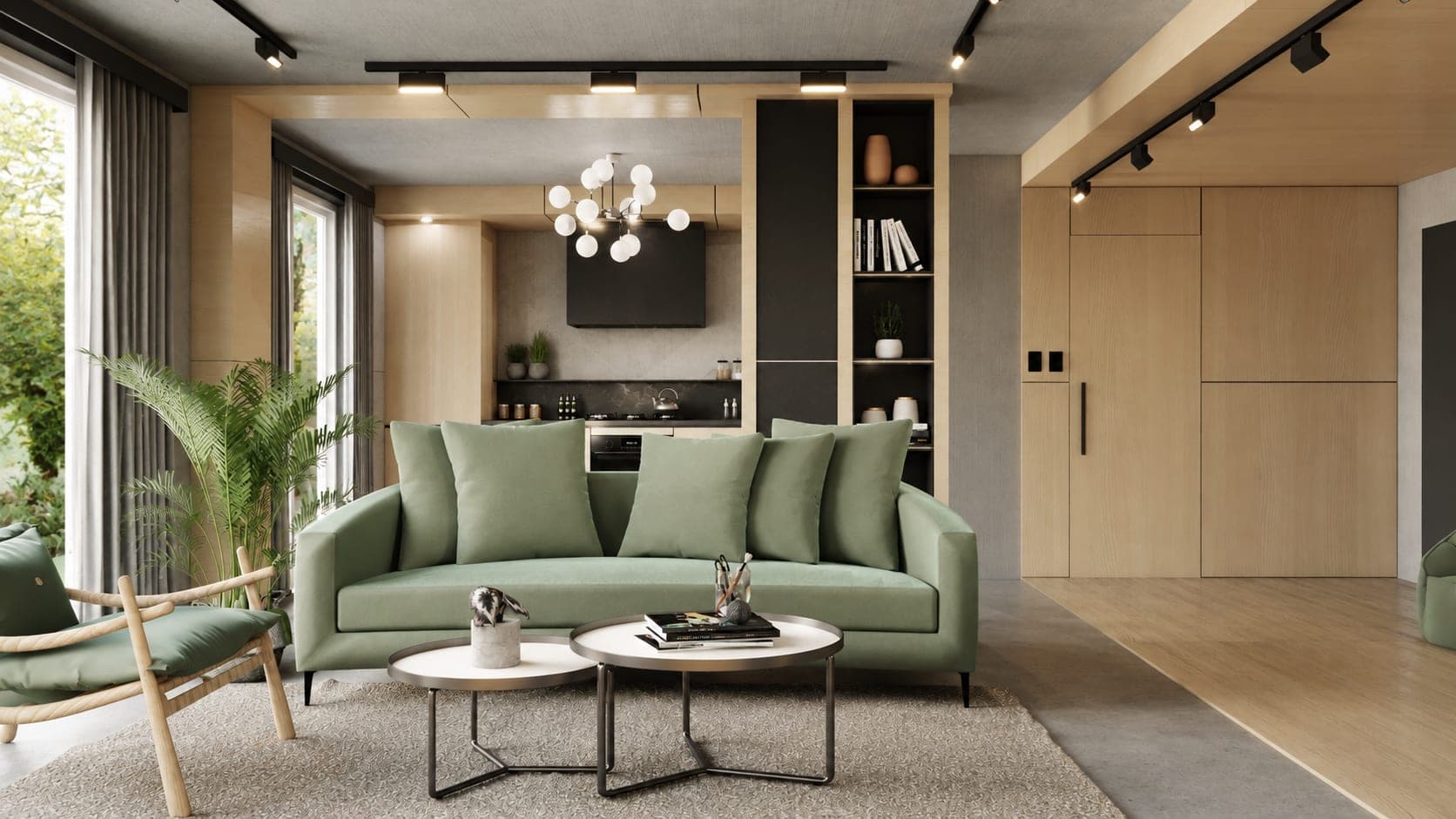 Sala de estar con sofá verde salvia abierta a la cocina